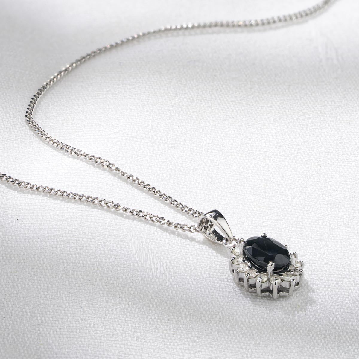 Sapphire 7 x 5mm And Diamond 9K White Gold Pendant Necklace